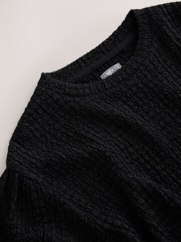 Next - Blusa en negro
