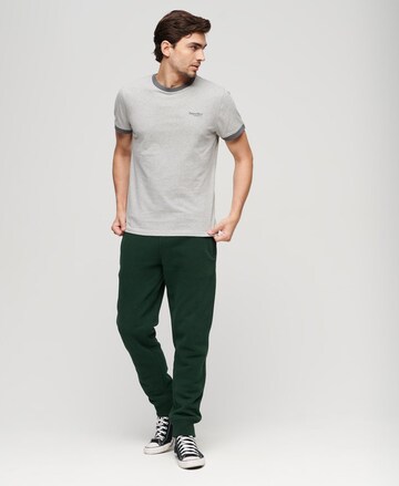 Superdry Tapered Hose 'Essential' in Grün