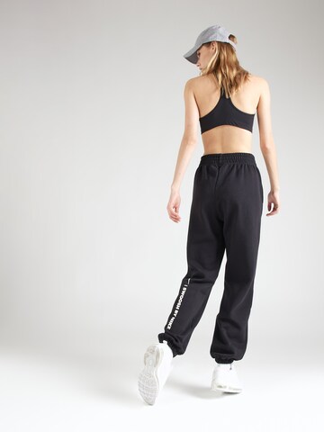 Effilé Pantalon Nike Sportswear en noir