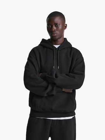 Sweat-shirt Bershka en noir : devant