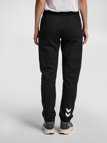 Hummel - Tapered Pantalón deportivo en negro