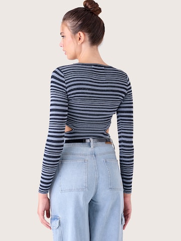 Pull-over 'MAVI' Camomilla en noir