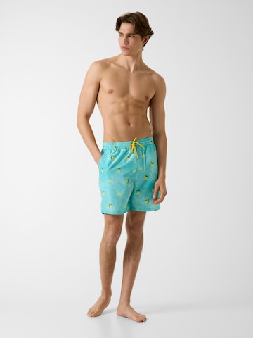 GUESS Badeshorts in Blau