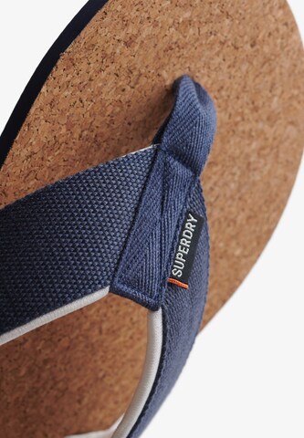 Tongs Superdry en blanc