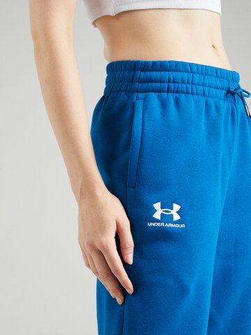 UNDER ARMOURTapered Sportske hlače 'Essential' - plava boja
