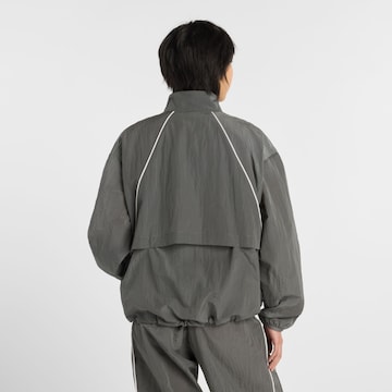 Veste de sport 'Sport Legacy Jacket' new balance en gris