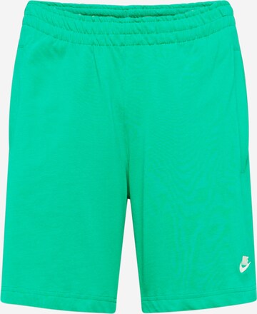 Regular Pantaloni 'CLUB' de la Nike Sportswear pe verde: față