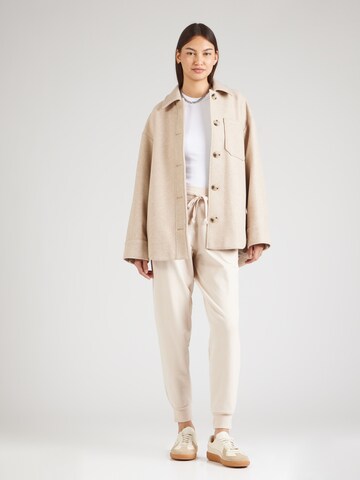ABOUT YOU Tapered Trousers 'Teena' in Beige