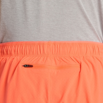 Regular Pantalon de sport 'RC 5' new balance en orange