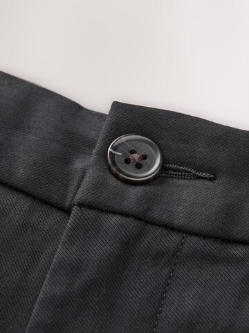 regular Pantaloni chino di Next in nero