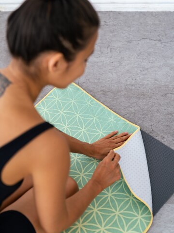 Tapis 'Flower of Life' woodsandwaves en mélange de couleurs