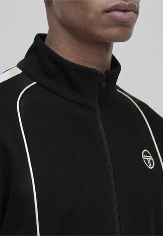 Completo per l'allenamento di Sergio Tacchini in nero: frontale