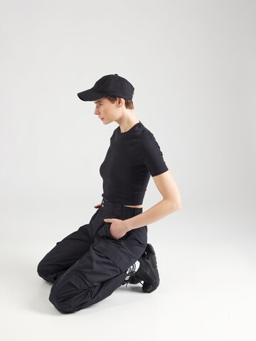 NIKE - Camiseta funcional en negro