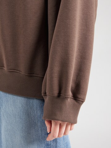 Sweat-shirt 'Viva' WEEKDAY en marron