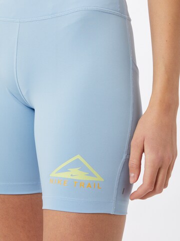 Skinny Pantalon de sport 'Fast' NIKE en bleu