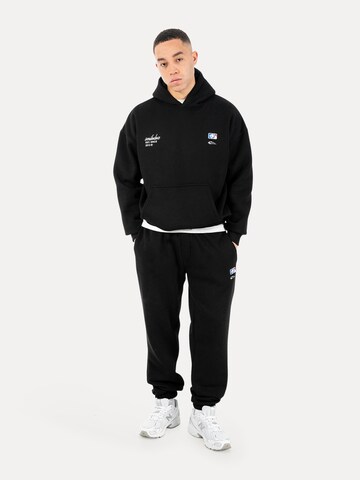 Smilodox Regular Jogginghose Striver in Schwarz