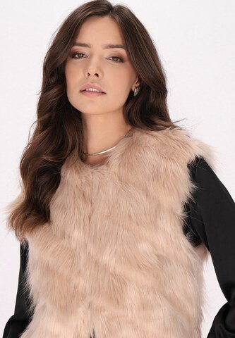 Gilet di faina in beige
