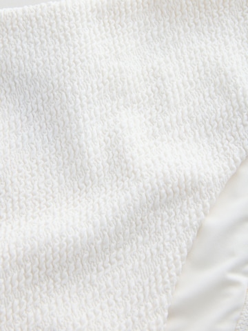 Next Bikinihousut värissä beige