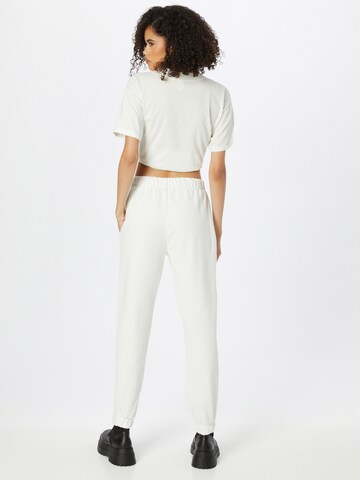 ABOUT YOU x INNA Tapered Broek 'Sandra' in Wit