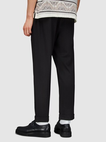 Regular Pantaloni 'HELM' de la AllSaints pe negru