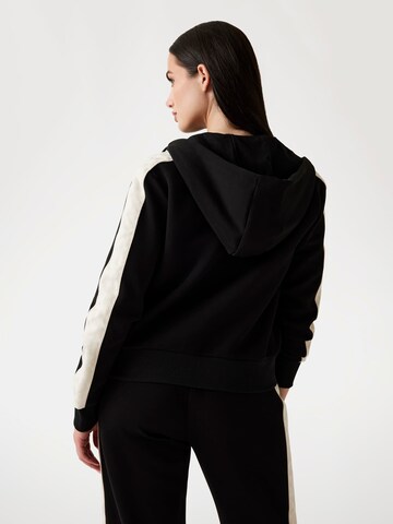 GUESS Sweatjacke in Schwarz