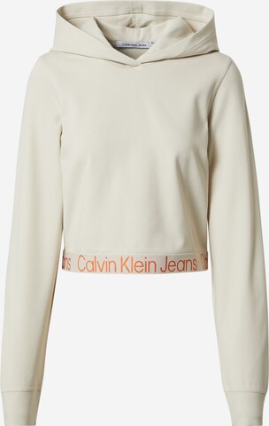 Sweat-shirt Calvin Klein Jeans en beige : devant