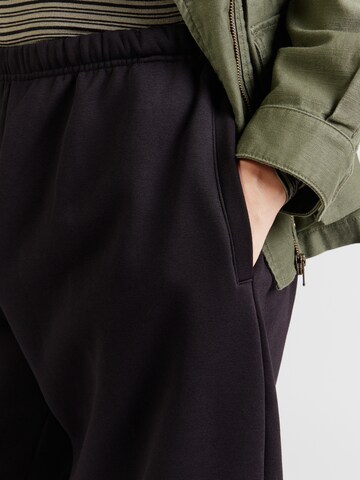 Tapered Pantaloni 'Ginny' di WEEKDAY in nero