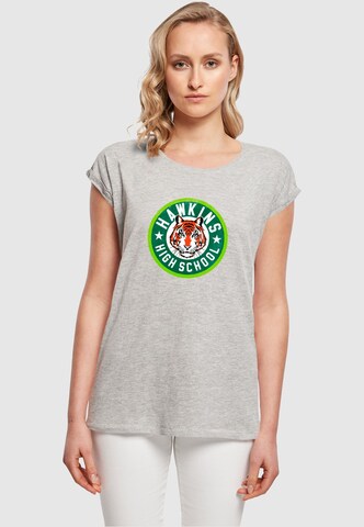 ABSOLUTE CULT T-Shirt 'Stranger Things - Hawkins Tiger Circle' in Grau: Vorderseite