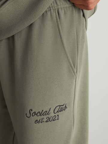 Grimelange Облекло за бягане в зелено