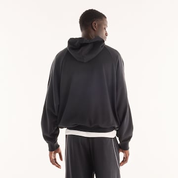 new balance - Sudadera 'Trackside' en negro