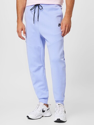 Effilé Pantalon Nike Sportswear en violet : devant