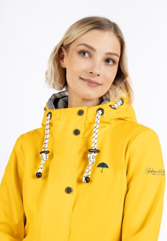 Manteau fonctionnel Schmuddelwedda en jaune