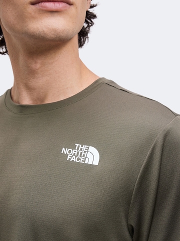 Tricou funcțional de la THE NORTH FACE pe verde
