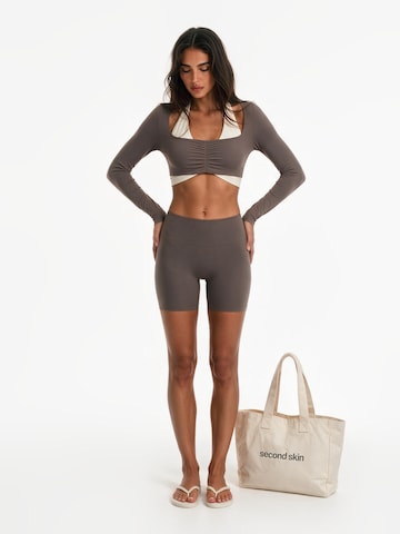 Skinny Leggings 'Second Skin Studio Biker Shorts' di GOD SAVE QUEENS in marrone