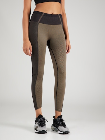 Athlecia Skinny Workout Pants in Brown: front