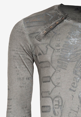 Rusty Neal Longsleeve mit coolem Front- Print in Grau