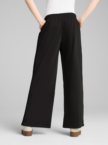 PUMA Wide leg Sports trousers 'Wardrobe Ess' in Black