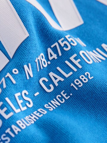 Next - Sudadera en azul