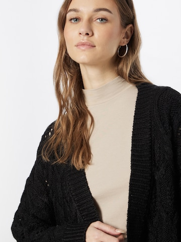 ABOUT YOU Knit Cardigan 'Goldie' in Black