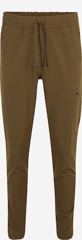 PUMA Workout Pants in Green: front