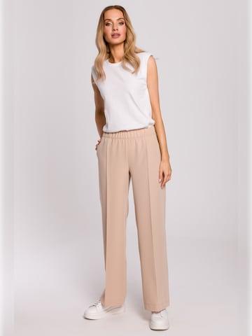 made of emotion - Loosefit Pantalón de pinzas en beige