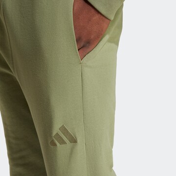 ADIDAS SPORTSWEAR Tapered Hose in Grün