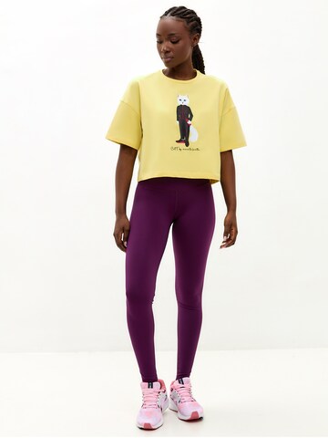 Cat e Lolette Shirt 'Sport Cat with Dumbbells' in Yellow: front