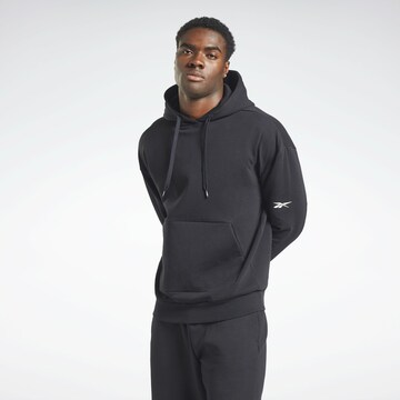 Sweat de sport Reebok en noir : devant