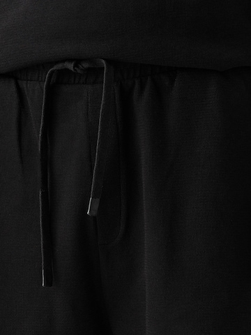 Bershka Loosefit Kalhoty – černá