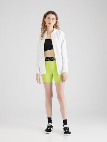 PUMA Skinny Športne hlače 'TRAIN STRONG 5' | zelena barva