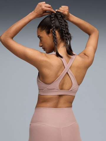 Top sportivo 'Puma Cloudspun Bra - Mid' di PUMA in lilla