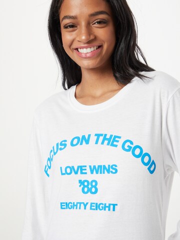 River Island - Camiseta 'FOCUS ON THE GOOD' en blanco