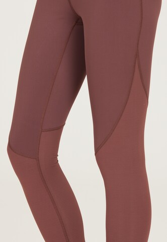 Athlecia Slim fit Workout Pants 'Elisary' in Red