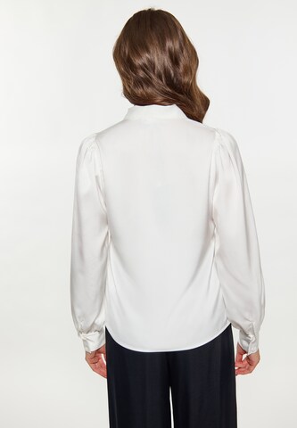 Camicia da donna di faina in bianco